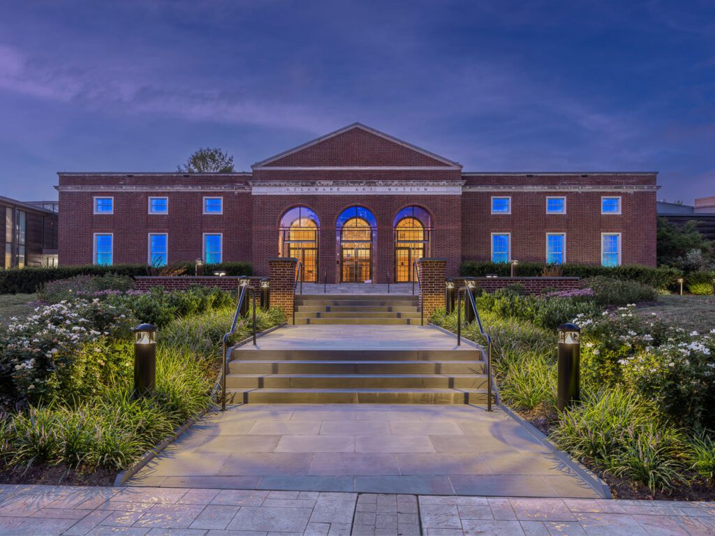 Grand Museum Entry with Formal Steps and Structured Planting