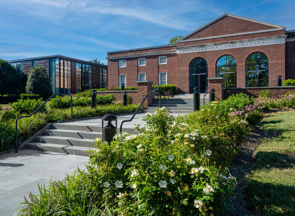 Framed Entry Plaza with Terraced Walkways and Garden Borders