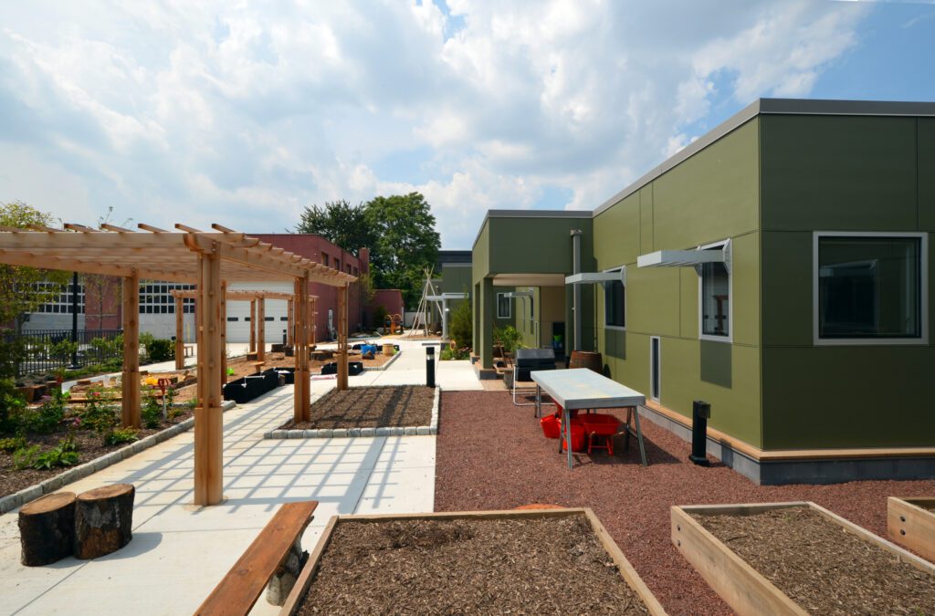 Hands-On Learning Zone Blending Play, Planting, and Built Form