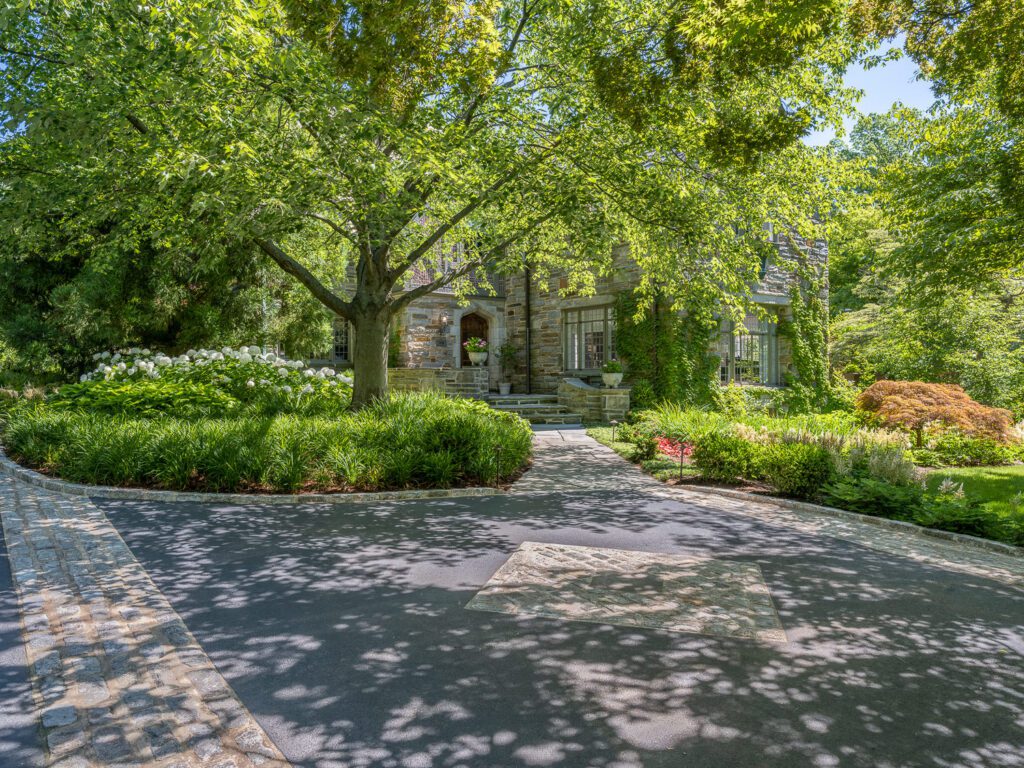 Entry Court Framed by Canopy and Stone