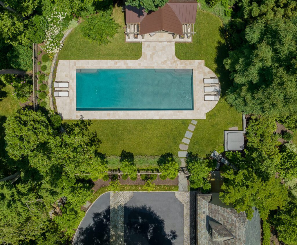 Rectilinear Pool Terrace with Pavilion and Woodland Edge